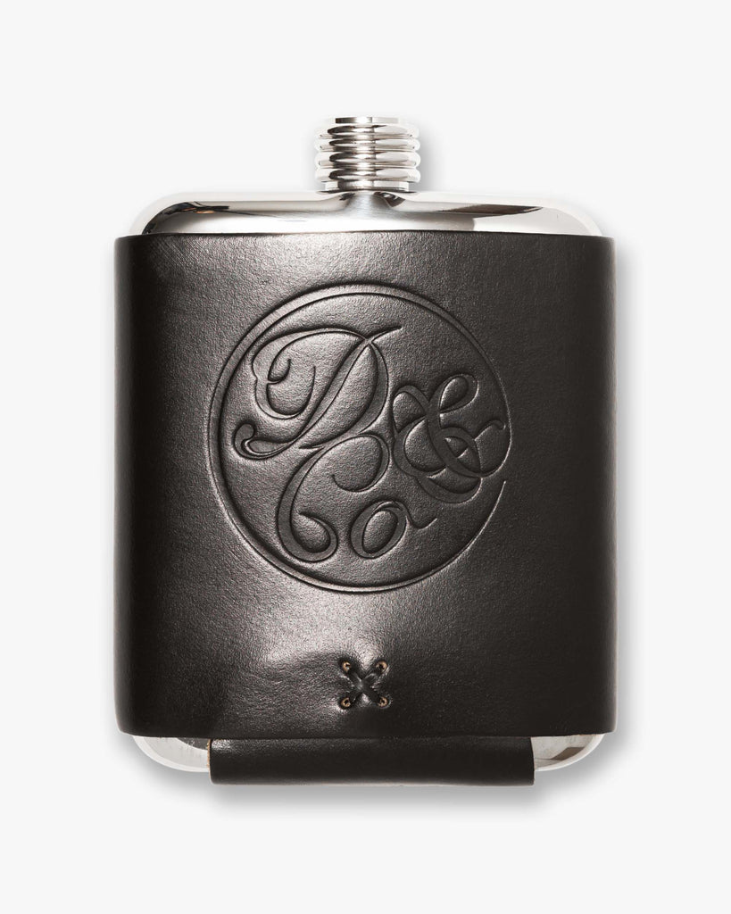 black leather wrapped flask with death & co. in circle design 